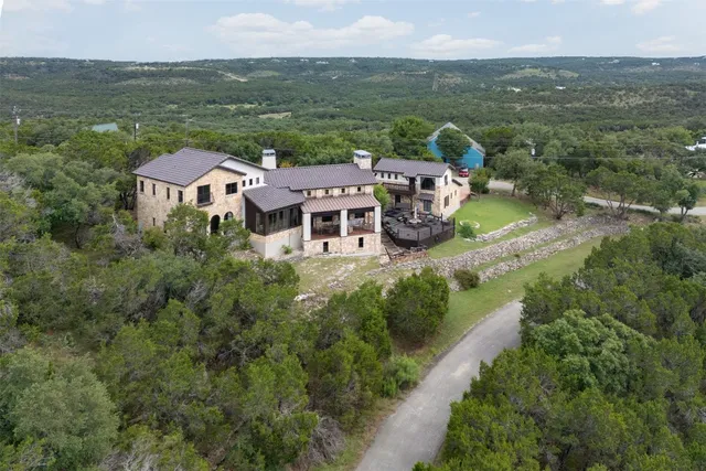 aerial view of a house with a garden