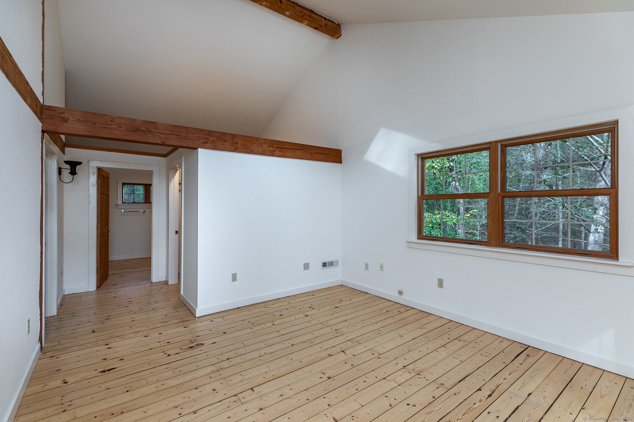 38 West Mountain Lane Roxbury, CT 06783 - Photo 14 of 26 a view of empty room with wooden floor and fan