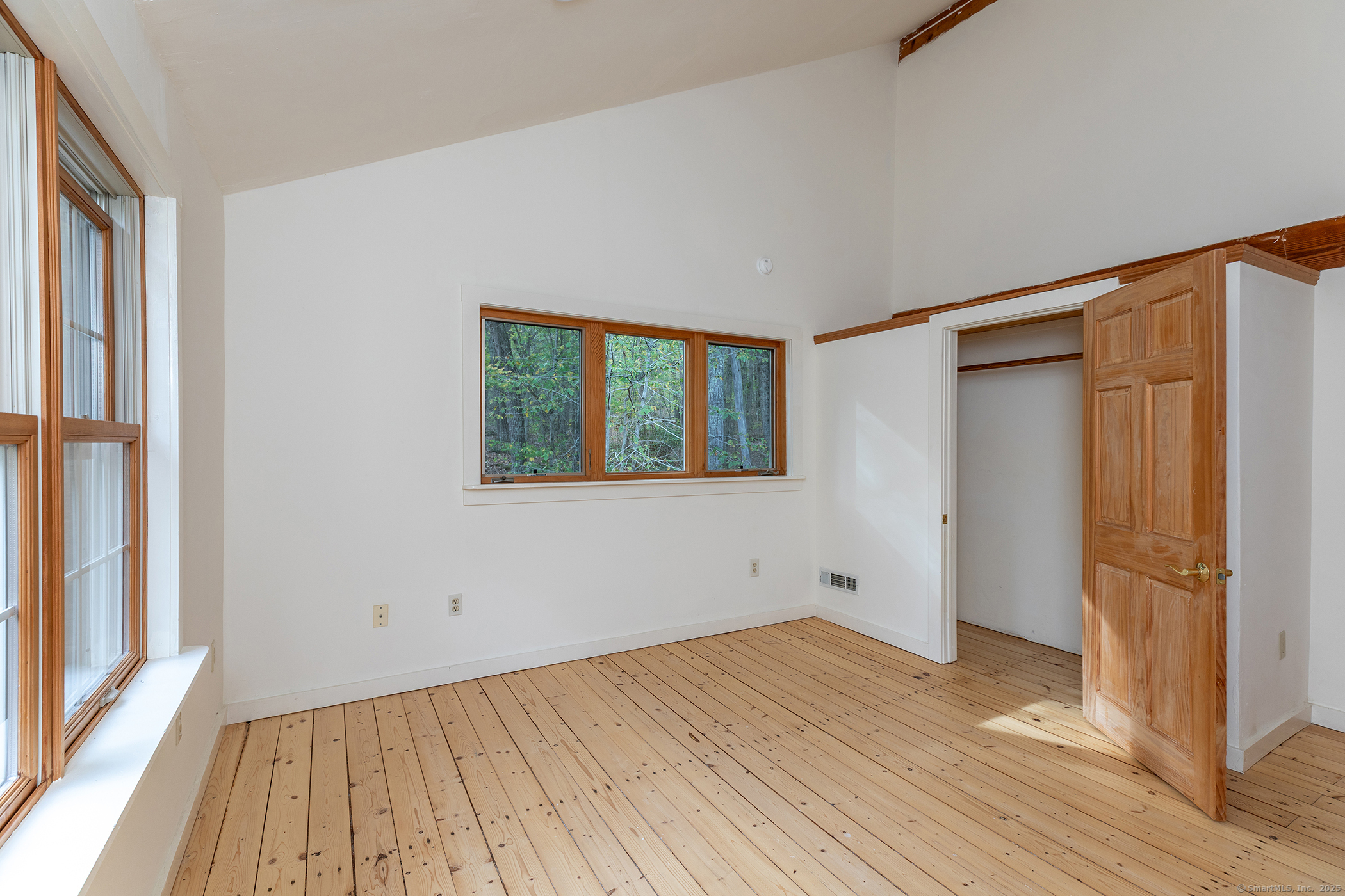 38 West Mountain Lane Roxbury, CT 06783 - Photo 16 of 26 a view of a room with wooden floor and a window