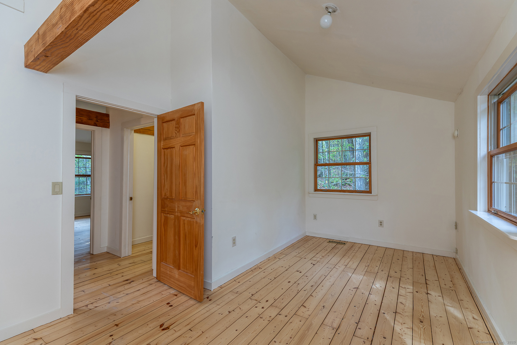 38 West Mountain Lane Roxbury, CT 06783 - Photo 17 of 26 a view of empty room with wooden floor and fan