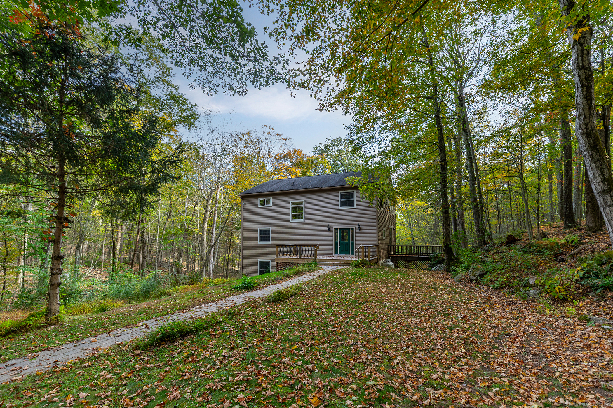 38 West Mountain Lane Roxbury, CT 06783 - Photo 2 of 26 a house view with a backyard space