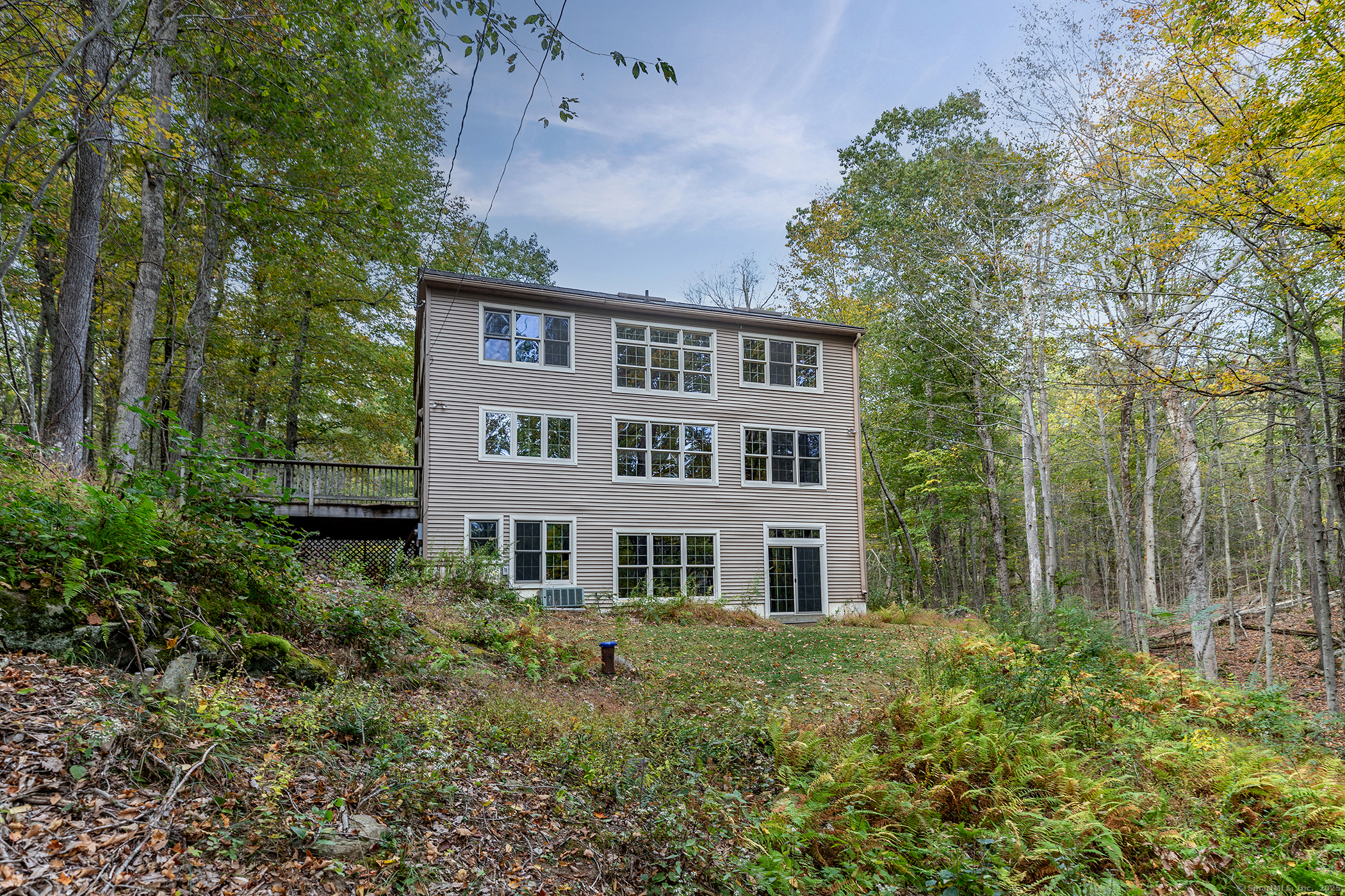38 West Mountain Lane Roxbury, CT 06783 - Photo 3 of 26 a front view of a house with a yard