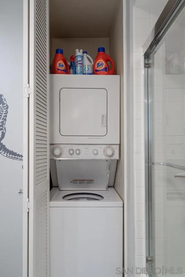 1770 Avenida Del Mundo, Unit 701 Coronado, CA 92118 - Photo 13 of 17 a utility room with dryer and washer