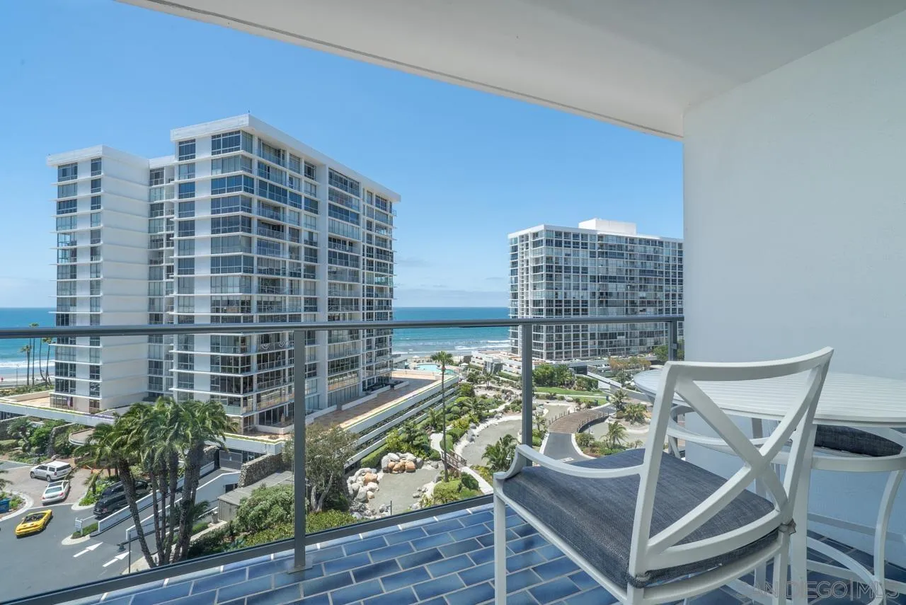 1770 Avenida Del Mundo, Unit 701 Coronado, CA 92118 - Photo 6 of 17 a view of a balcony with two chairs and a table