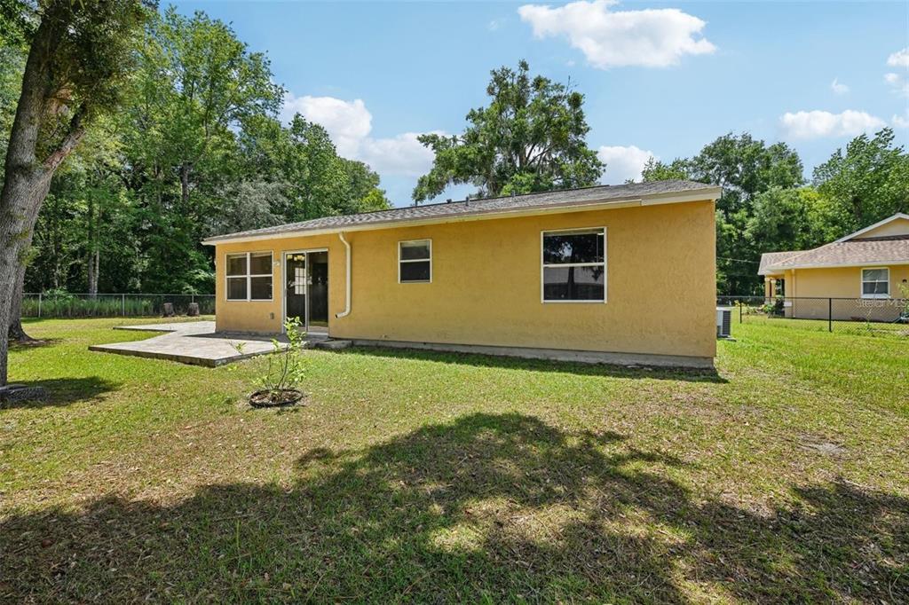 5 Cedar Lane Ocala, FL 34472 - Photo 21 of 23 a house view with a backyard space