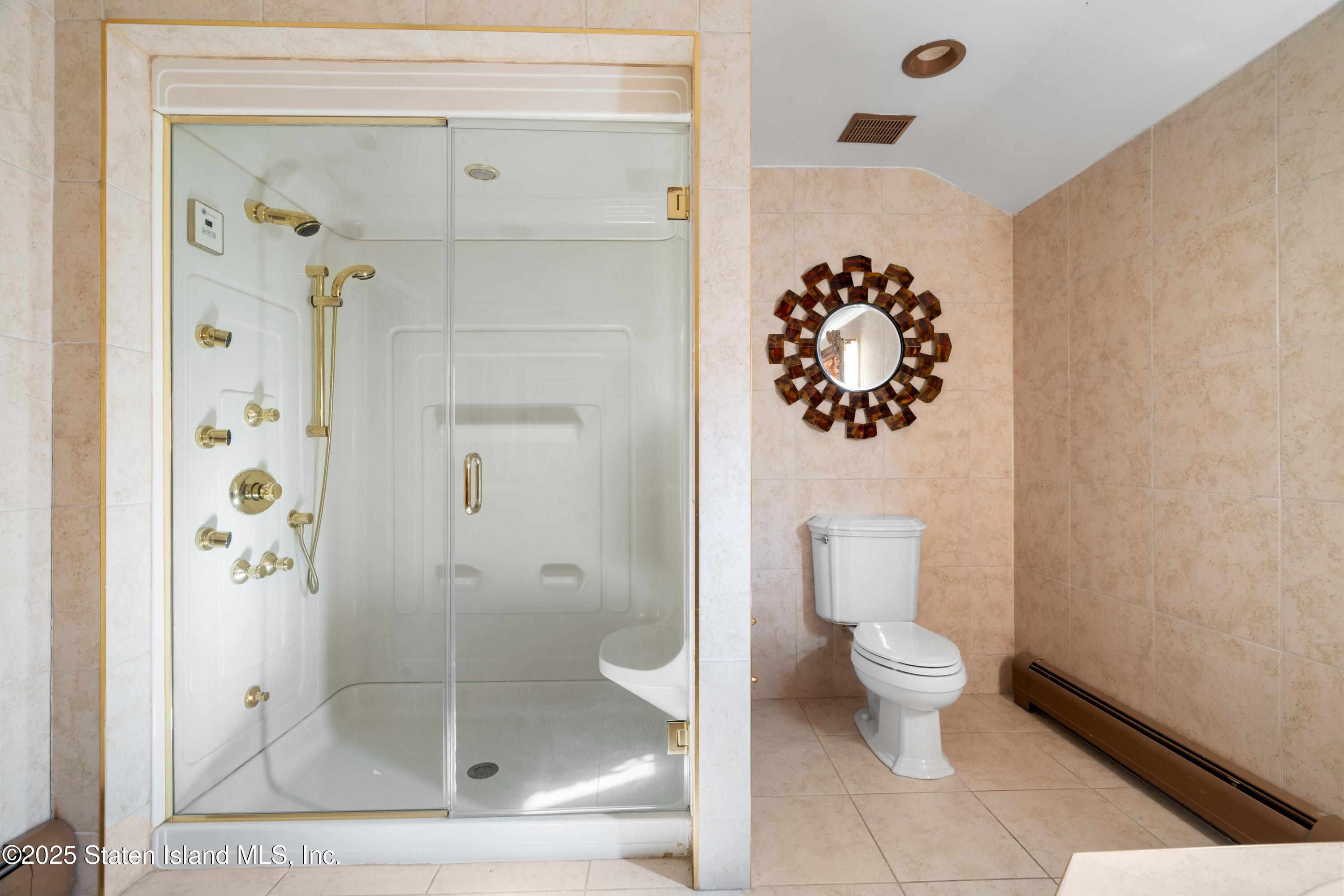 287 Rensselaer Avenue Staten Island, NY 10312 - Photo 23 of 35 a bathroom with a shower