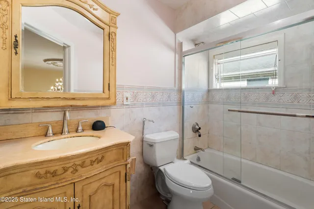 a large kitchen with lots of counter space cabinets a sink and appliances