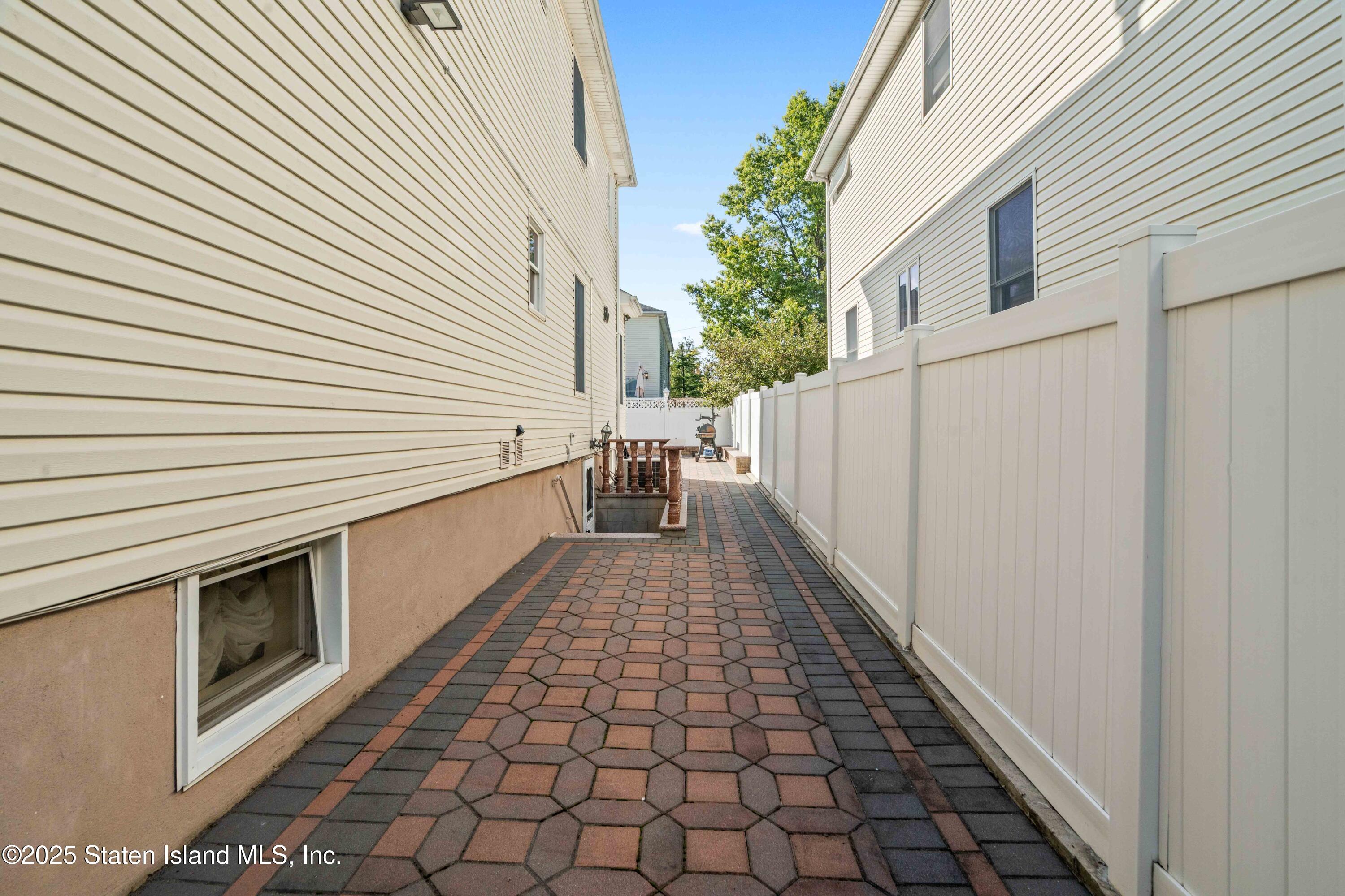 287 Rensselaer Avenue Staten Island, NY 10312 - Photo 3 of 35 a close view of a backyard with sitting area