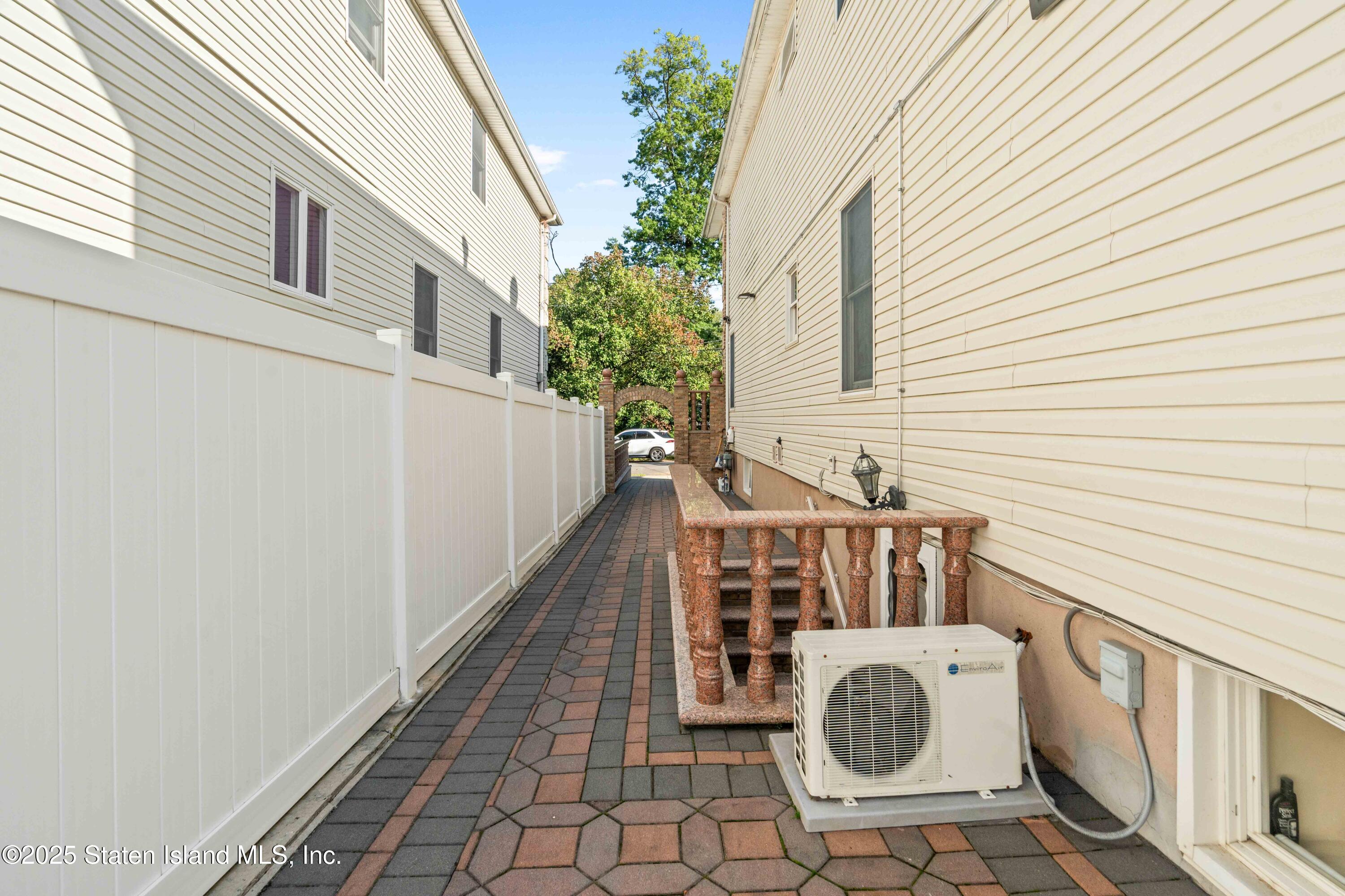 287 Rensselaer Avenue Staten Island, NY 10312 - Photo 4 of 35 a view of entryway with washer and dryer
