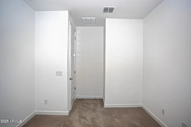 an empty room with closet