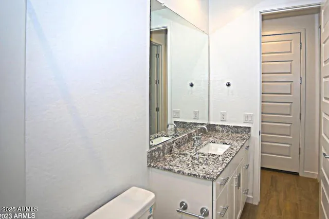 a view of kitchen with wooden floor