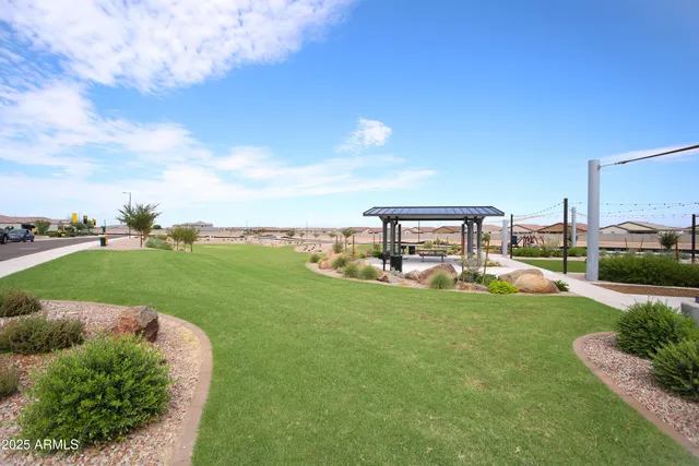 a view of a street with a cars parked