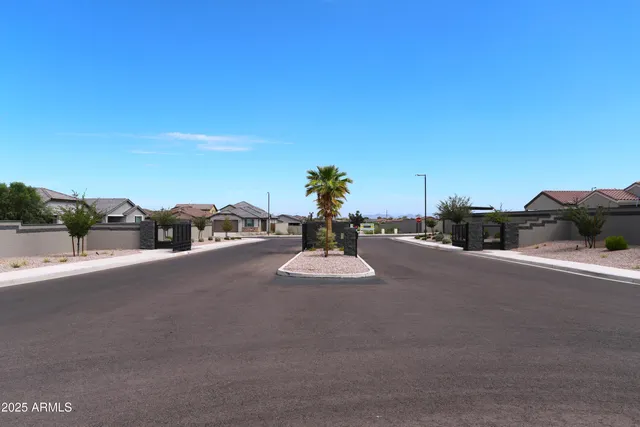 a view of swimming pool with outdoor seating and plants