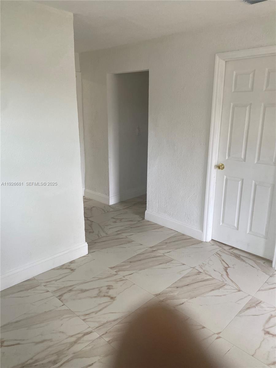 2122 Northwest 5th Street Pompano Beach, FL 33069 - Photo 11 of 53 a view of an empty room