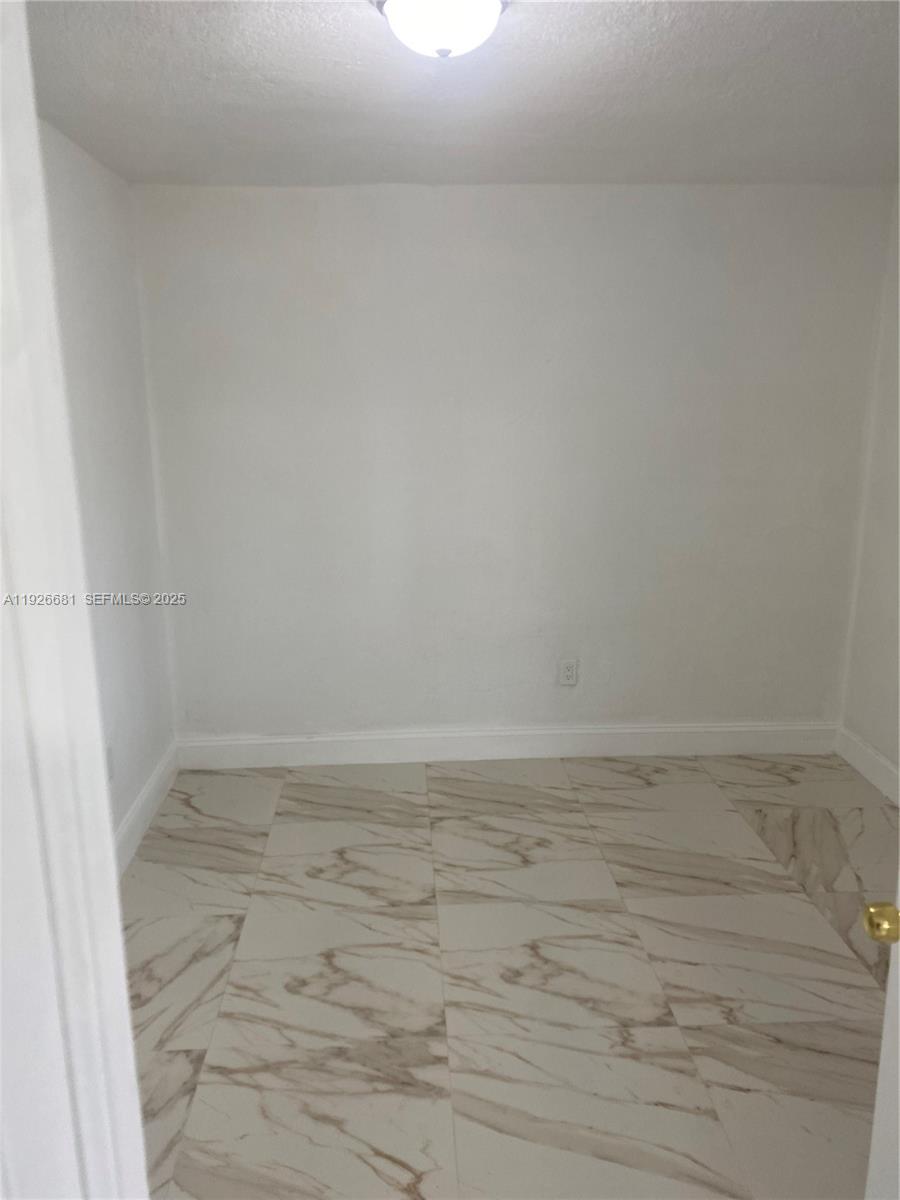 2122 Northwest 5th Street Pompano Beach, FL 33069 - Photo 13 of 53 a view of a small space