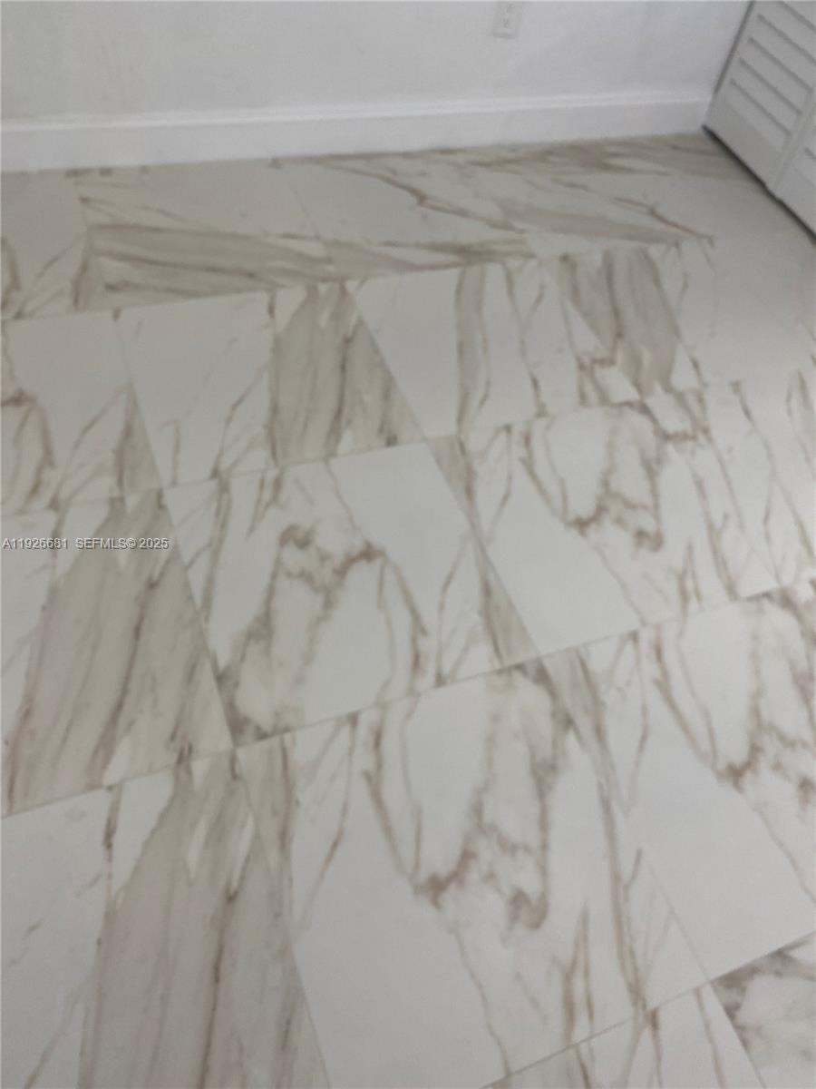 2122 Northwest 5th Street Pompano Beach, FL 33069 - Photo 16 of 53 a close view of shower tap