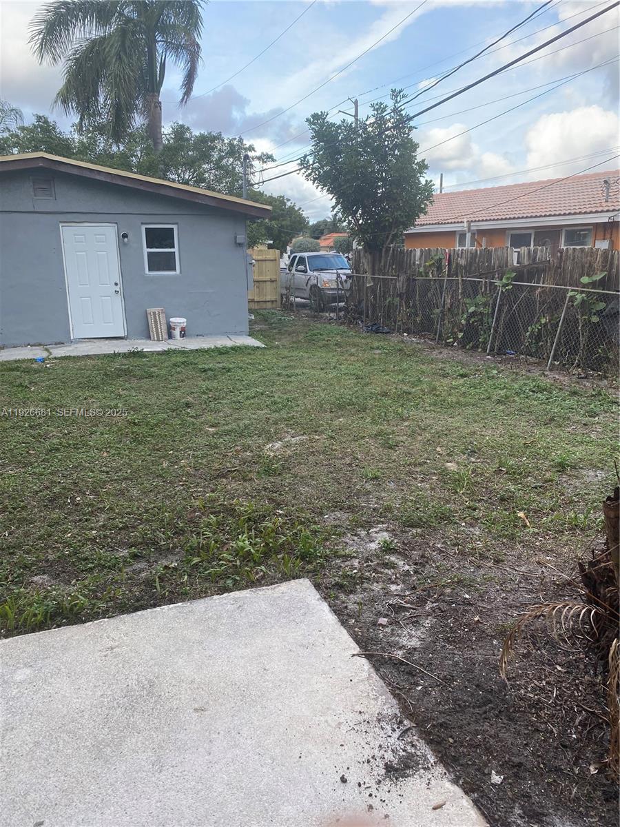 2122 Northwest 5th Street Pompano Beach, FL 33069 - Photo 45 of 53 a backyard of a house with lots of green space