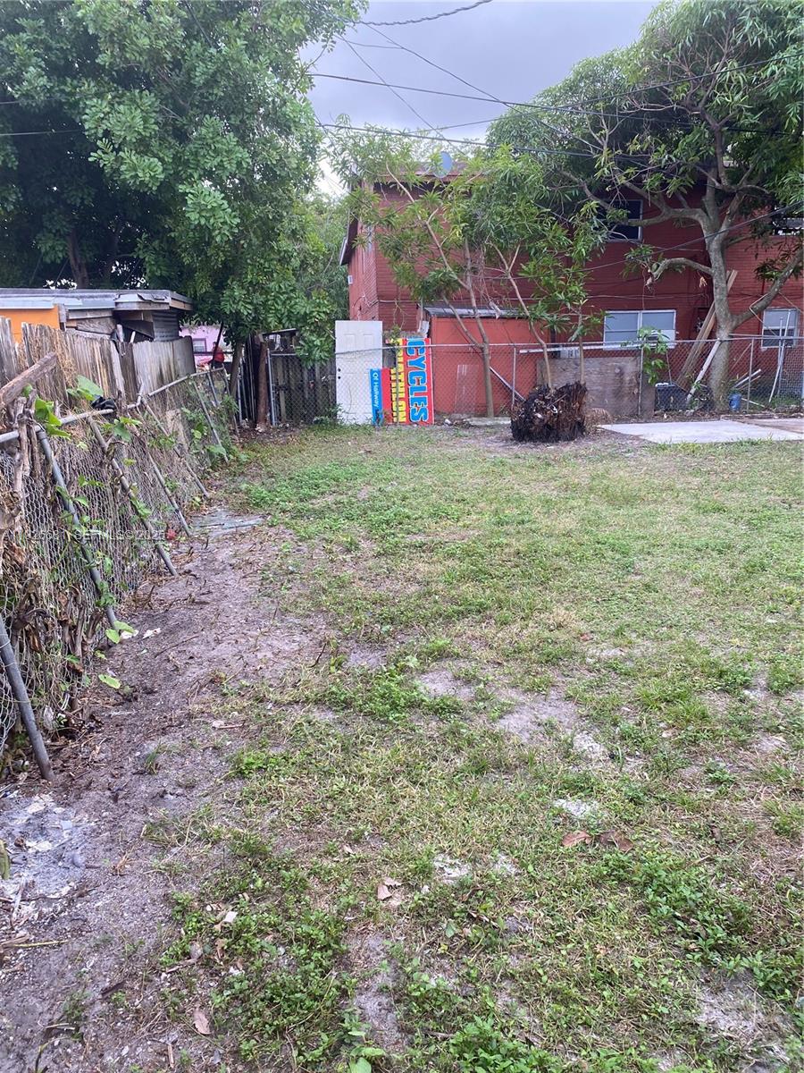 2122 Northwest 5th Street Pompano Beach, FL 33069 - Photo 52 of 53 a view of a house with a yard