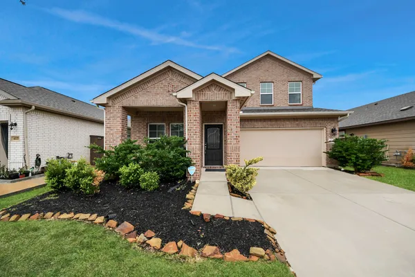 a kitchen with stainless steel appliances kitchen island granite countertop a sink and cabinets