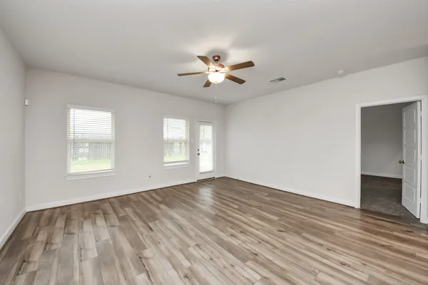 a bedroom with a bed furniture and a window