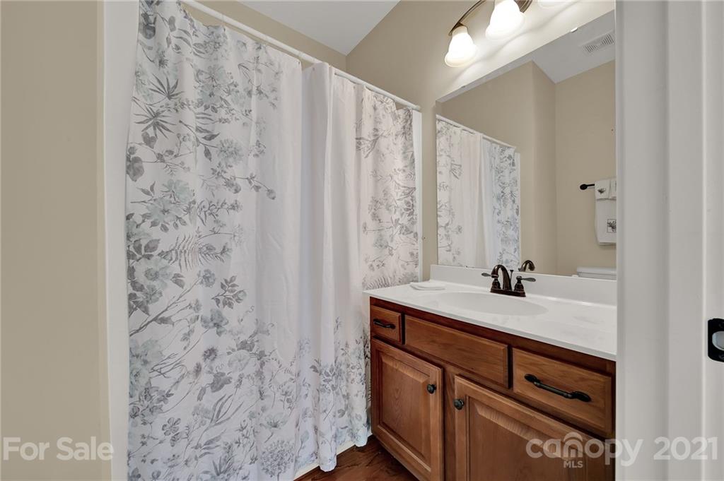 1185 Reservation Road Rock Hill, SC 29730 - Photo 14 of 47 a bathroom with a granite countertop sink and a mirror