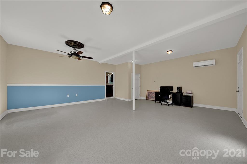1185 Reservation Road Rock Hill, SC 29730 - Photo 27 of 47 a view of an empty room with furniture and a ceiling fan