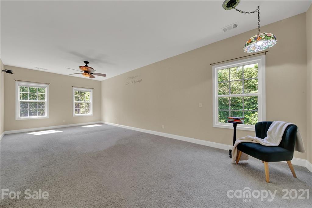 1185 Reservation Road Rock Hill, SC 29730 - Photo 32 of 47 a view of an empty room with a window and chair