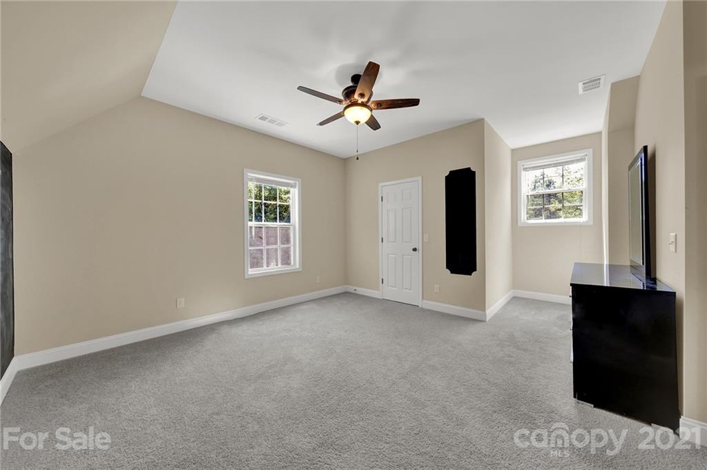 1185 Reservation Road Rock Hill, SC 29730 - Photo 40 of 47 an empty room with windows and fan