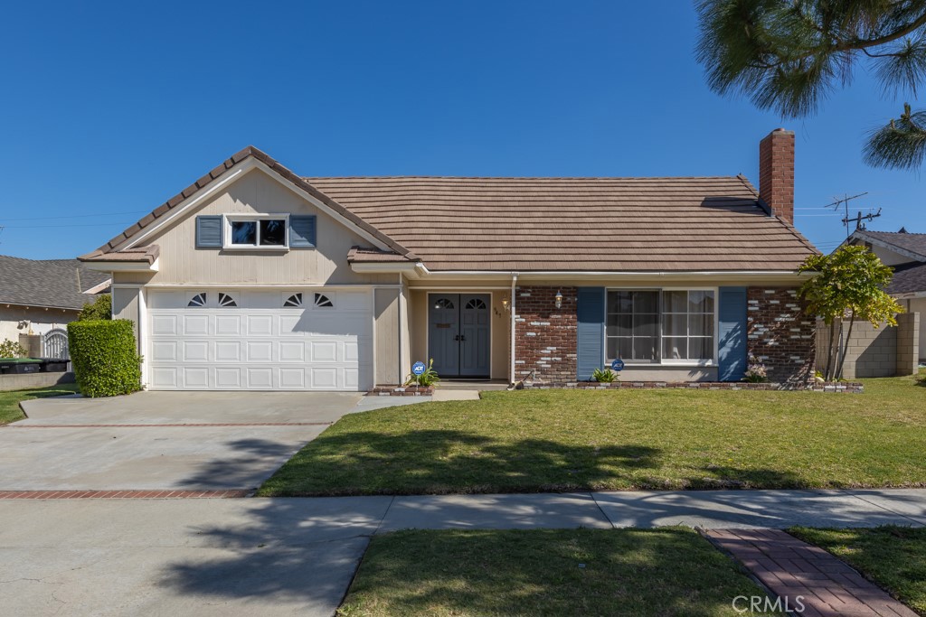 947 South Cunningham Drive Whittier, CA 90601 - Photo 1 of 1 a view of a house with garden and yard