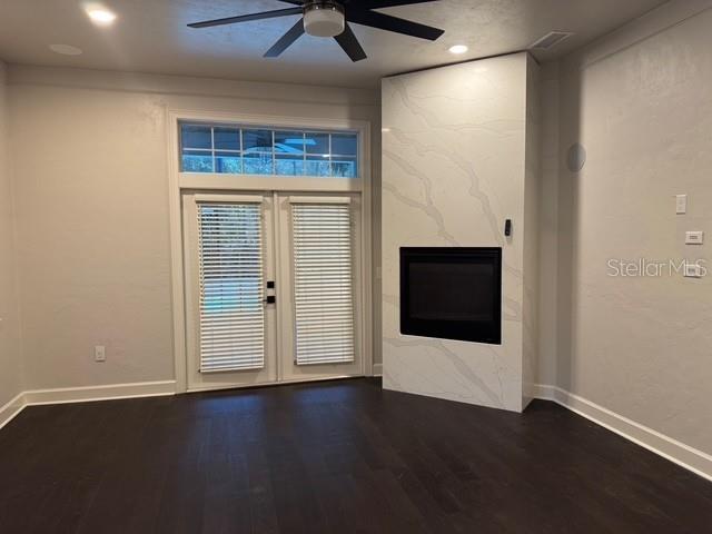 10104 Southwest 17th Place Gainesville, FL 32607 - Photo 13 of 21 an empty room with wooden floor and windows