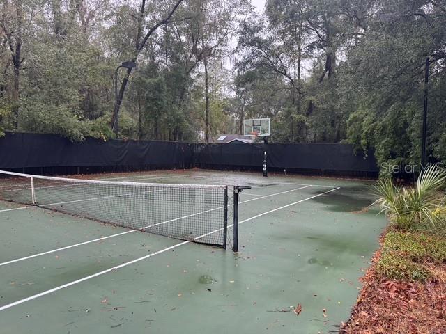 10104 Southwest 17th Place Gainesville, FL 32607 - Photo 20 of 21 a view of a tennis court