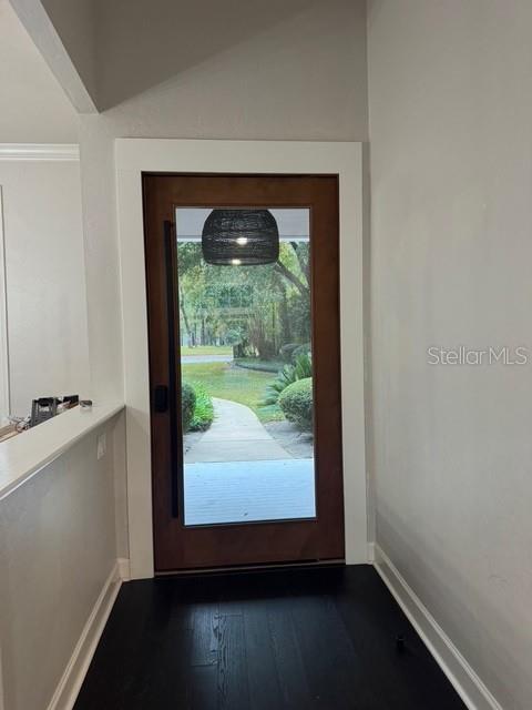 10104 Southwest 17th Place Gainesville, FL 32607 - Photo 3 of 21 a view of a porch with wooden floor and a window