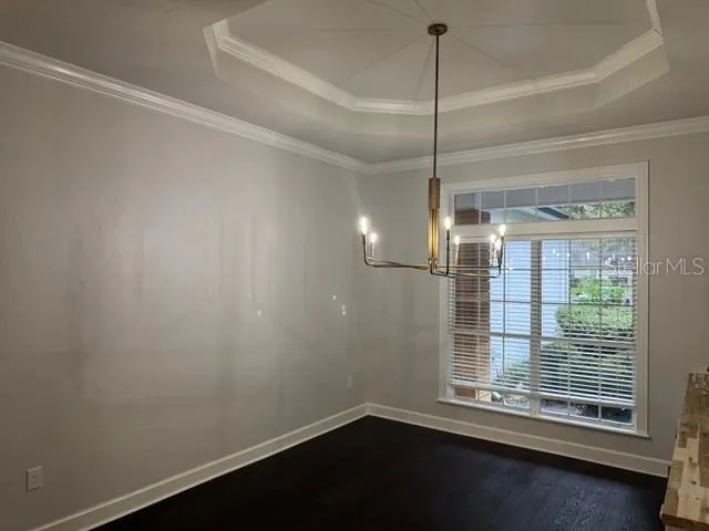 a room with window and a wooden floor