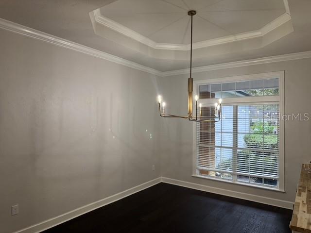 10104 Southwest 17th Place Gainesville, FL 32607 - Photo 8 of 21 a room with window and a wooden floor