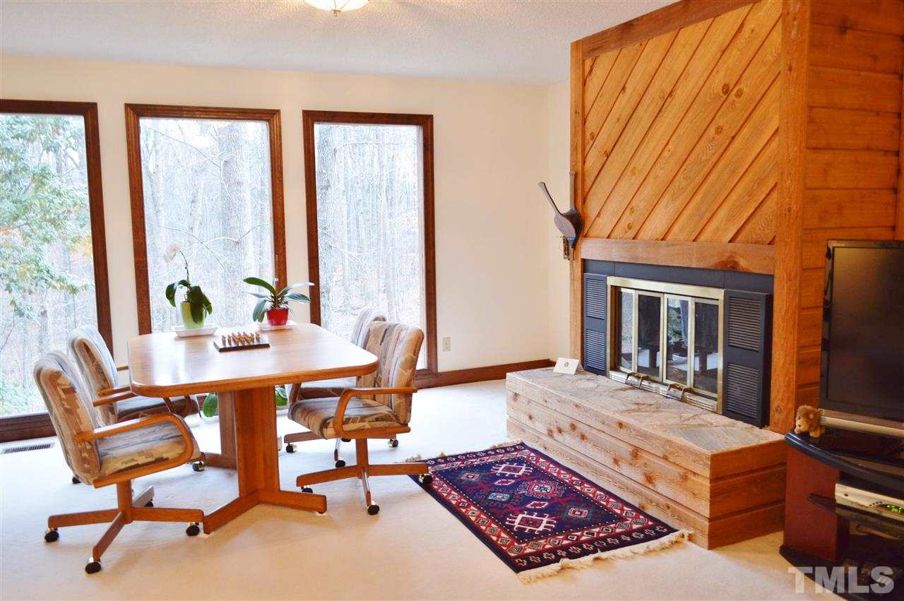 5200 Caber Road Raleigh, NC 27613 - Photo 13 of 25 a living room with a large window
