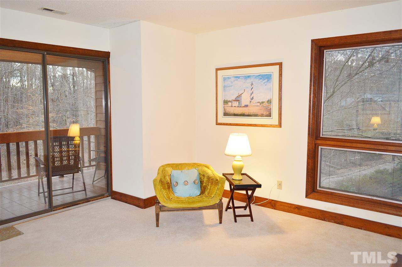 5200 Caber Road Raleigh, NC 27613 - Photo 17 of 25 a view of a livingroom with furniture and a large window
