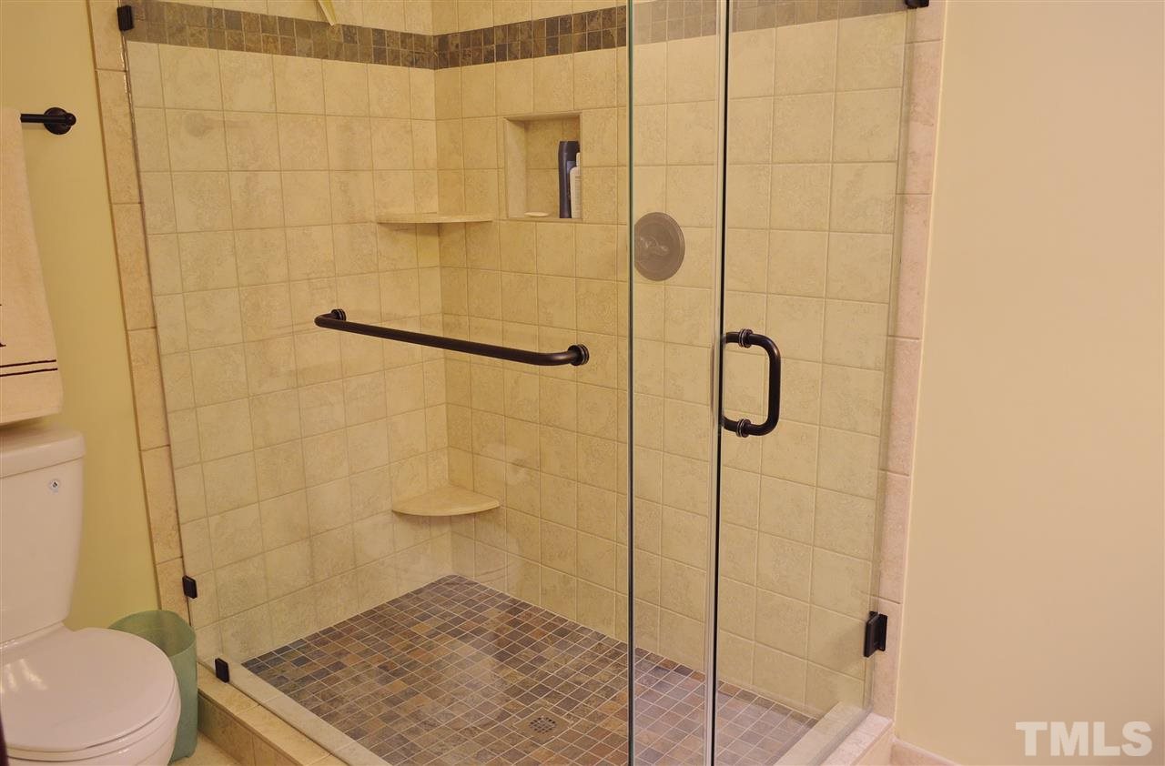 5200 Caber Road Raleigh, NC 27613 - Photo 19 of 25 a bathroom with a shower