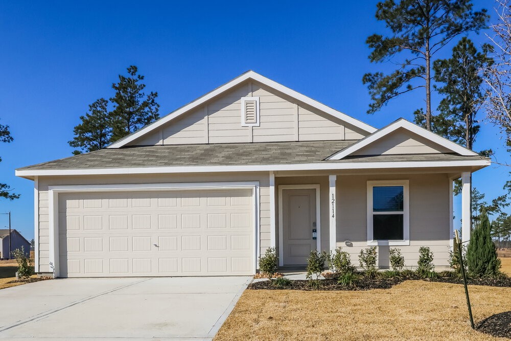 12114 Kellsway Court Conroe, TX 77306 - Photo 1 of 16 a front view of a house