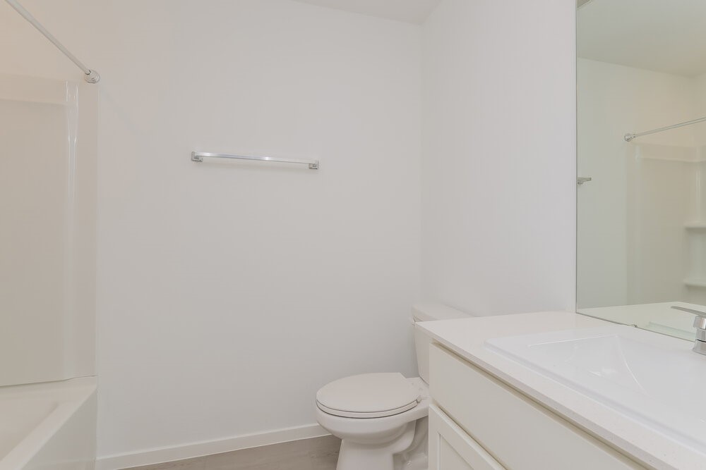 12114 Kellsway Court Conroe, TX 77306 - Photo 12 of 16 a bathroom with a toilet and a sink