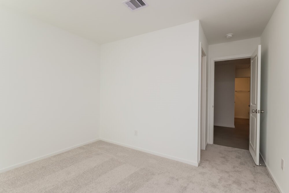 12114 Kellsway Court Conroe, TX 77306 - Photo 14 of 16 a view of an empty room