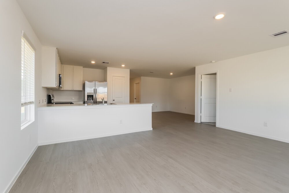 12114 Kellsway Court Conroe, TX 77306 - Photo 3 of 16 a view of kitchen and kitchen with a sink