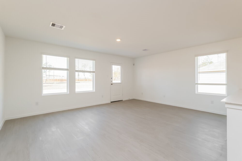 12114 Kellsway Court Conroe, TX 77306 - Photo 5 of 16 an empty room with a window