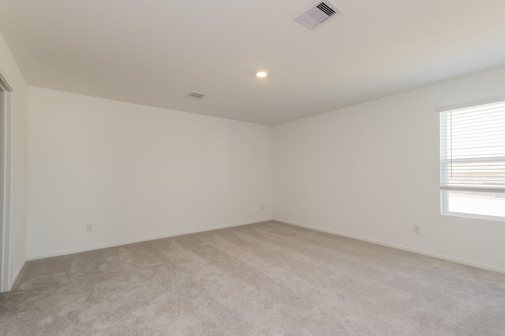 12114 Kellsway Court Conroe, TX 77306 - Photo 8 of 16 an empty room with a window