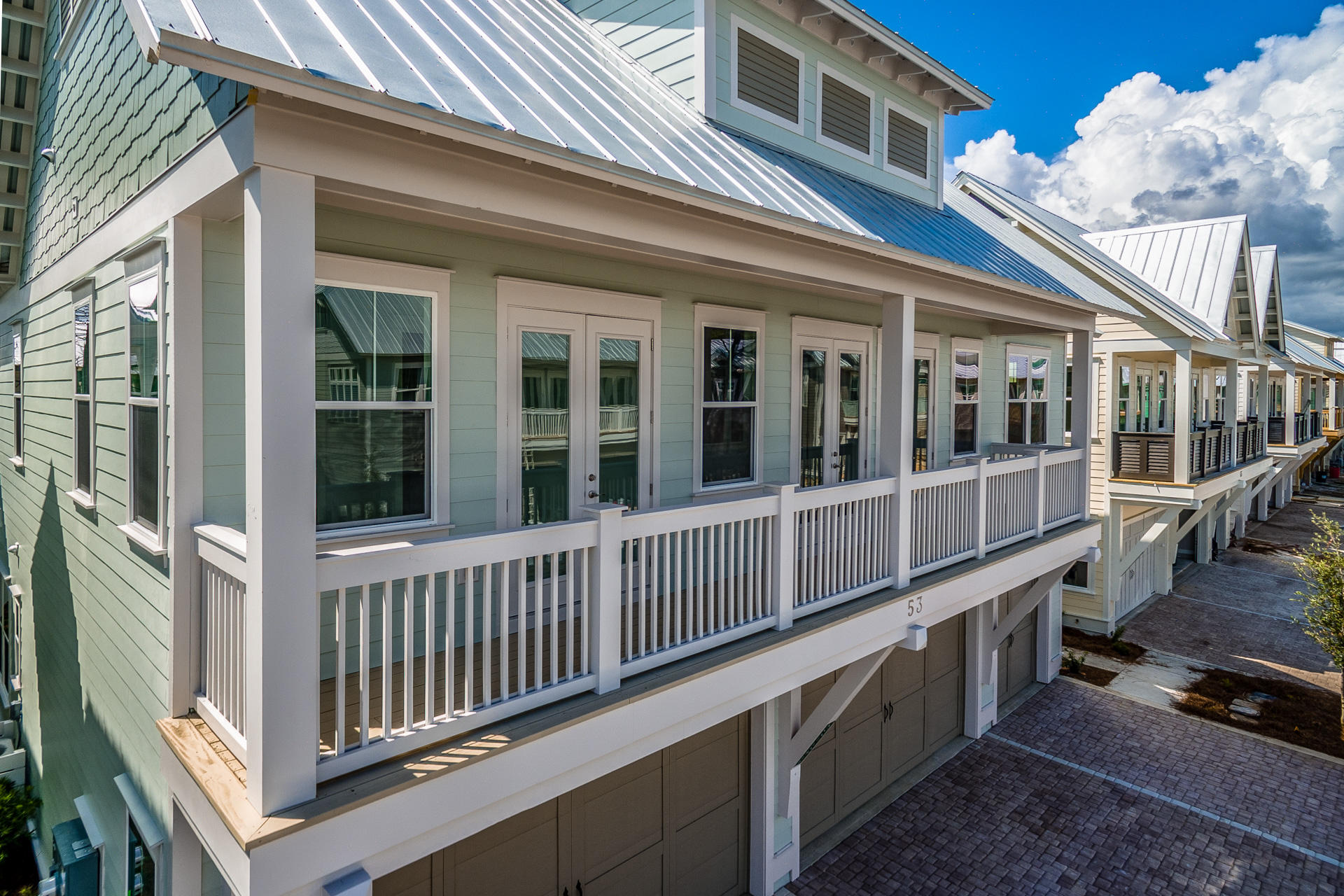 88 Pine Lands Loop Inlet Beach East, Unit C Inlet Beach, FL 32461 - Photo 1 of 21 a view of a large building from a balcony