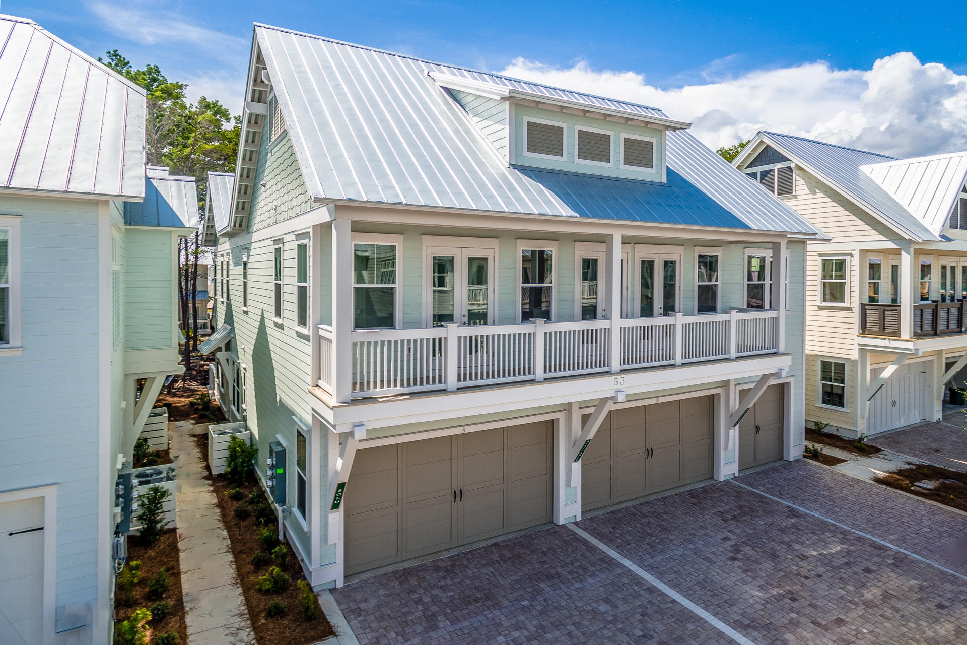 88 Pine Lands Loop Inlet Beach East, Unit C Inlet Beach, FL 32461 - Photo 2 of 21 a view of a house with a backyard