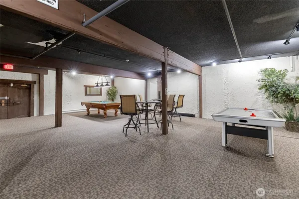 a living room with furniture and a table