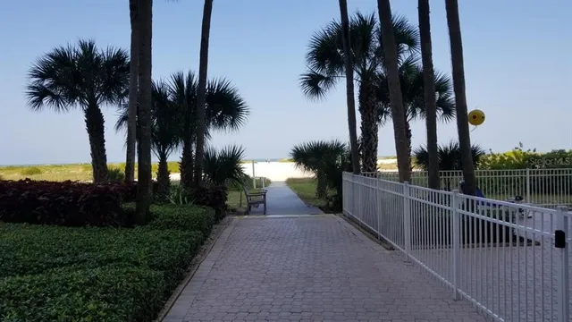 a view of a lake with outdoor seating