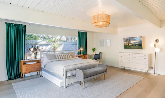 a bathroom with a sink toilet and a mirror