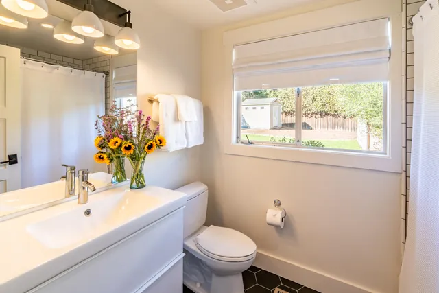 a bed room with furniture and a window