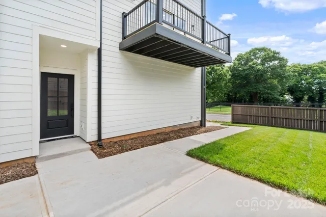 a view of backyard with green space